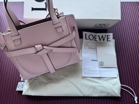 Authentic Loewe Gate Top Handle Bag (Category: Luxury Bags & Wallets) located in Cebu City. Submitted by golden123 (Listing ID 1365599756, Image 1). Description: used only once bought in Amsterdam baby pink color 17 x 23.5 x 8.5cm with removable adjustable shoulder strap complete inclusions with receipt.