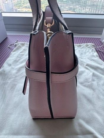 Authentic Loewe Gate Top Handle Bag (Category: Luxury Bags & Wallets) located in Cebu City. Submitted by golden123 (Listing ID 1365599756, Image 2). Description: used only once bought in Amsterdam baby pink color 17 x 23.5 x 8.5cm with removable adjustable shoulder strap complete inclusions with receipt.