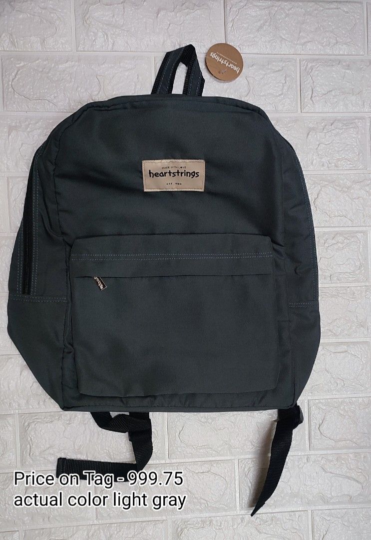 Light Gray Backpack Heartstrings (Category: Backpacks) located in Quezon City. Submitted by gemaicloset (Listing ID 1365641953, Image 1). Description: original heartstrings with paper bag.