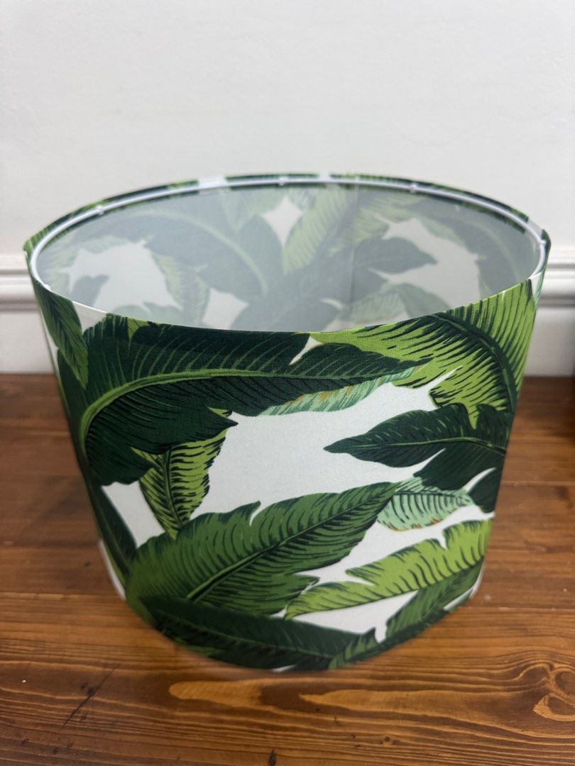 LAMP SHADE COVER (Category: Lighting) located in Cainta. Submitted by e.collections (Listing ID 1365642788, Image 2). Description: Lamp Shade Cover Green leaves print Height: 10 inches Diameter: 13 inches RFS: not fit with my lamp shade.