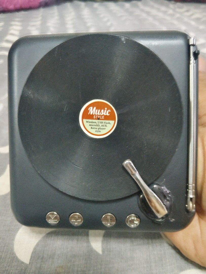 mini speaker turntable (Category: Portable Music Players) located in Manila. Submitted by boyhet.thrift15 (Listing ID 1365528868, Image 3). Description: mini speaker bluetooth/TF card/AUX/no usb cord kasama bili na,lang kayo micro usb slight used item nd gud condition naman.selling 350.