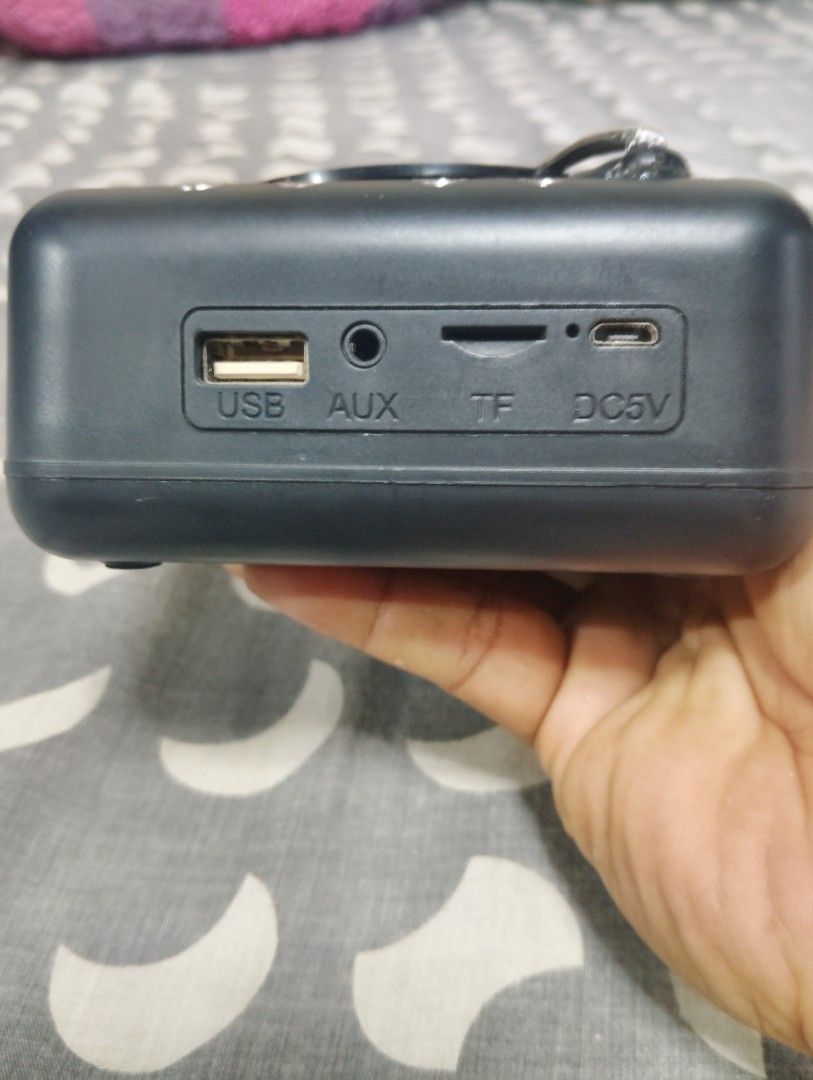 mini speaker turntable (Category: Portable Music Players) located in Manila. Submitted by boyhet.thrift15 (Listing ID 1365528868, Image 2). Description: mini speaker bluetooth/TF card/AUX/no usb cord kasama bili na,lang kayo micro usb slight used item nd gud condition naman.selling 350.