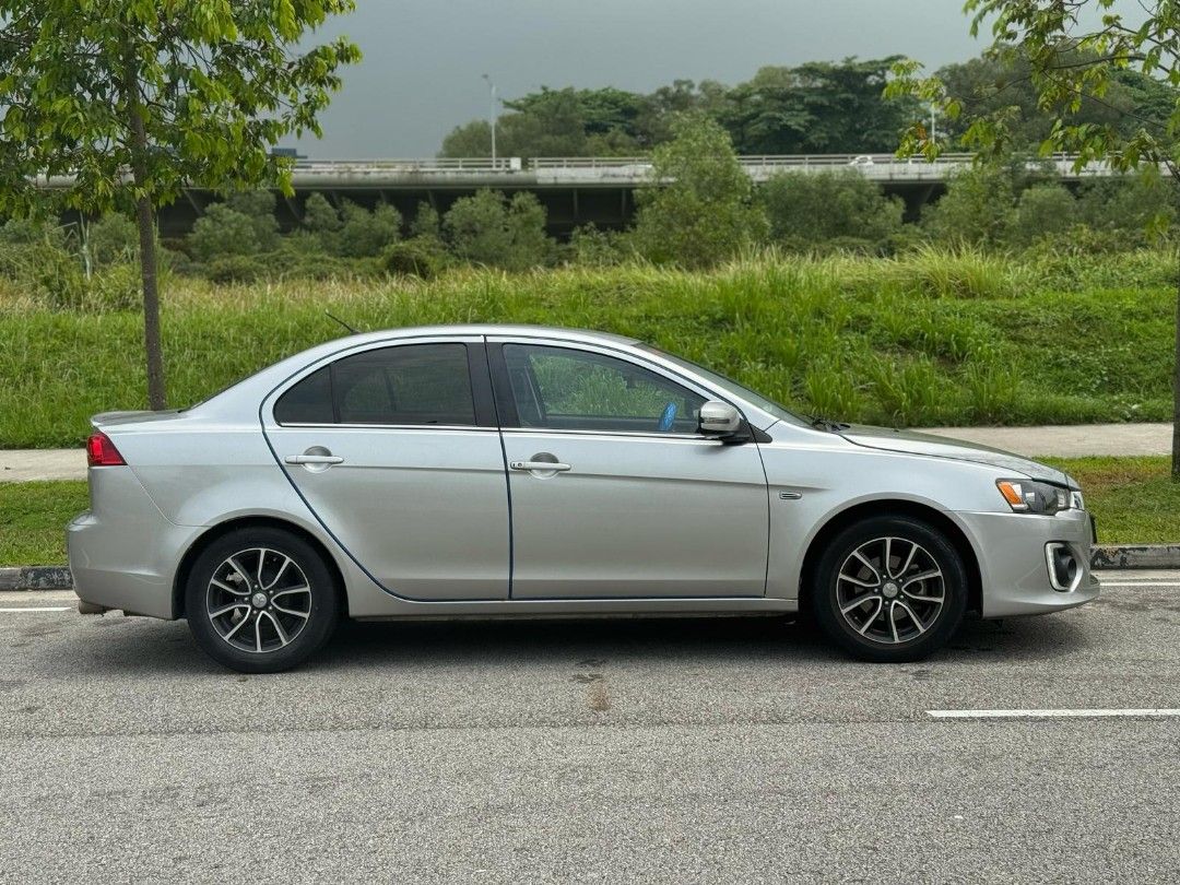 Mitsubishi Lancer EX 1.6A (OPC) Auto (Category: Used Cars) located in Singapore. Submitted by preciseauto (Listing ID 1365514259, Image 3). Description: 🔥🔥BOSS SAY ALL MUST GO CLEARANCE SALE🔥🔥 🚨CHEAPEST CARS IN THE MARKET🚨 🚘$500 DRIVEAWAY🚘 🏦LOWEST INTEREST FROM 1.48%🏦 🟢1 YEAR WARRANTY🟢 🔧FREE 1 YEAR SERVICING🔧 🏬 Vehicle 120 Points INSPECTION CHECK By In House Workshop BEFORE we put them for SALE 🚕 PHV Drivers Welcomed 🔁 High Trade