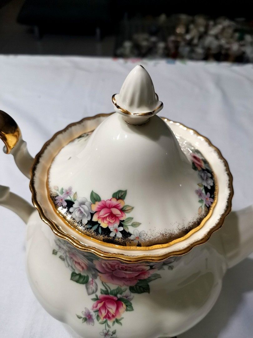 Royal Albert "Operatta" Large teapot in vgc (Category: Coffee & Tea Tableware) located in Pasig City. Submitted by singledadreseller (Listing ID 1365503381, Image 3). Description: Royal Albert "Operatta" Large teapot in very good condition Bone china made in england Very rare and hard to find.