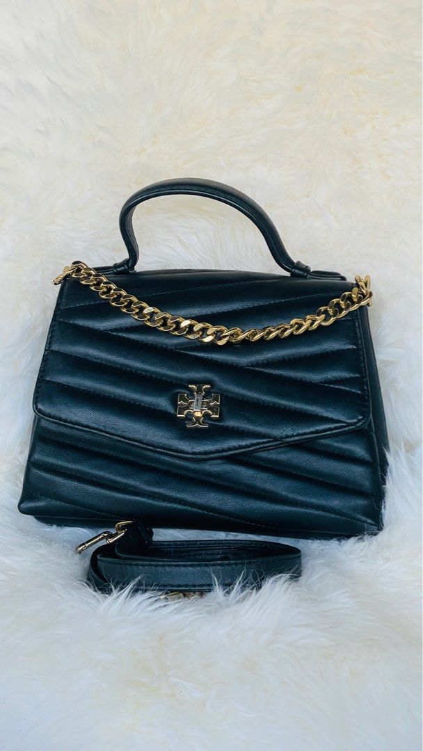 Tory Burch Kira top handle (Category: Luxury Bags & Wallets) located in Manila. Submitted by fuzzyblooms (Listing ID 1365616518, Image 2). Description: Overall good as new. W/ fadings lang sa hardware dun sa bukasan.