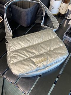 Beyond the vines poofy bag