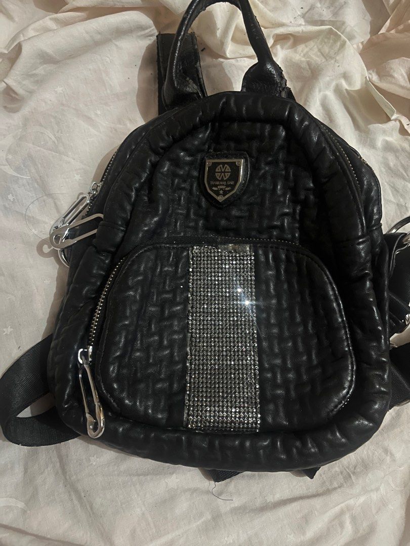 Black Small Backpack (Category: Backpacks) located in Santa Rosa. Submitted by mo0chimi (Listing ID 1365797594, Image 1). Description: Black Small Backpack - Has gem details (some gems are missing) - Overall still in good condition - Not suitable for sensitive buyers (please manage expectations).