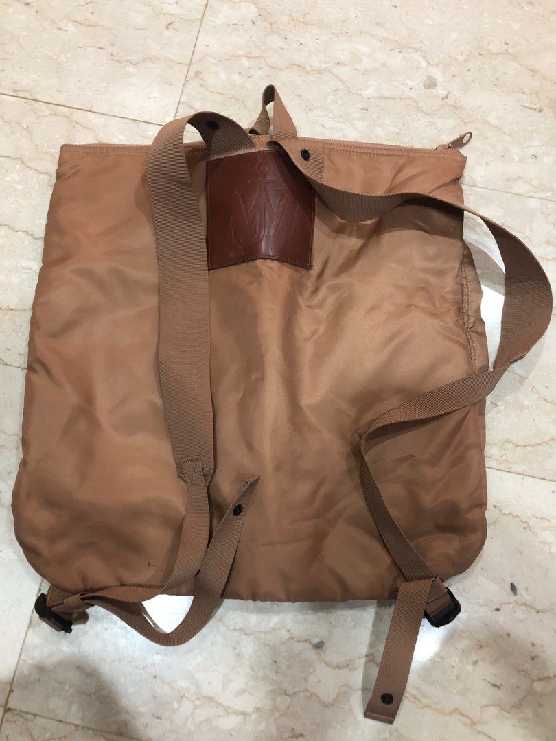 Brown Backpack (Category: Backpacks) located in Singapore. Submitted by ibiz8 (Listing ID 1365744926, Image 3). Description: Lightly used brown backpack. It has a few minor scuffs and marks, but overall in good condition. It's a great size for everyday use and has a spacious main compartment. The straps are adjustable and comfortable to wear. It's a great option for students, commuters, or anyone who needs a reliable backpack..