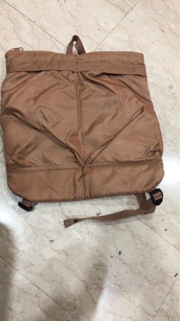 Brown Backpack (Category: Backpacks) located in Singapore. Submitted by ibiz8 (Listing ID 1365744926, Image 1). Description: Lightly used brown backpack. It has a few minor scuffs and marks, but overall in good condition. It's a great size for everyday use and has a spacious main compartment. The straps are adjustable and comfortable to wear. It's a great option for students, commuters, or anyone who needs a reliable backpack..