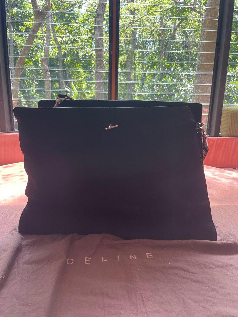 Celine Sac A Main Suede Bag in black (Category: Luxury Bags & Wallets) located in Cavite. Submitted by dosamigas (Listing ID 1365751368, Image 3). Description: 1 WEEK ONLY! 10,000php OFF Guaranteed Authentic With Entrupy certification Celine sac a main suede bag Navy blue inner leather Black suede outer with silver celine chain insert clasp with celine dustbag Width:17.3 in Height:12.2 in Depth:4.7 in Price negotiable .