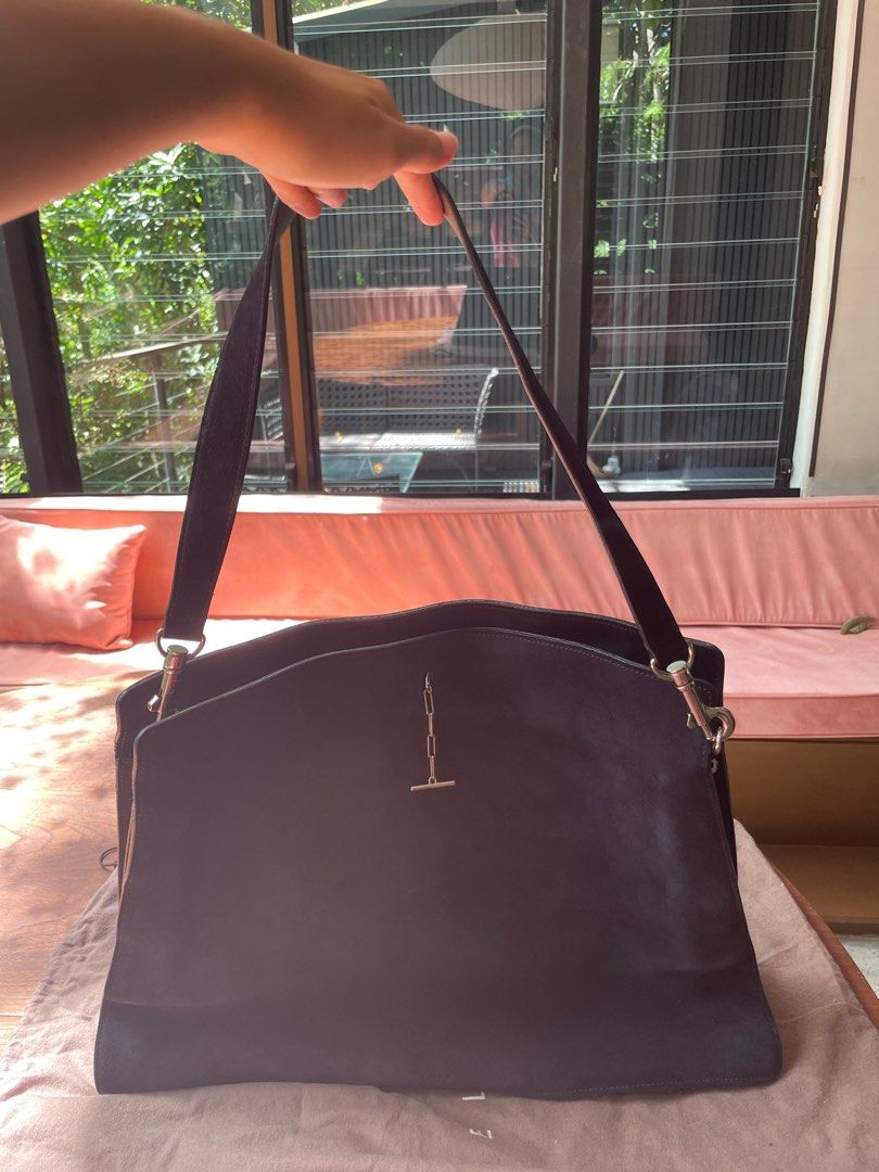 Celine Sac A Main Suede Bag in black (Category: Luxury Bags & Wallets) located in Cavite. Submitted by dosamigas (Listing ID 1365751368, Image 2). Description: 1 WEEK ONLY! 10,000php OFF Guaranteed Authentic With Entrupy certification Celine sac a main suede bag Navy blue inner leather Black suede outer with silver celine chain insert clasp with celine dustbag Width:17.3 in Height:12.2 in Depth:4.7 in Price negotiable .