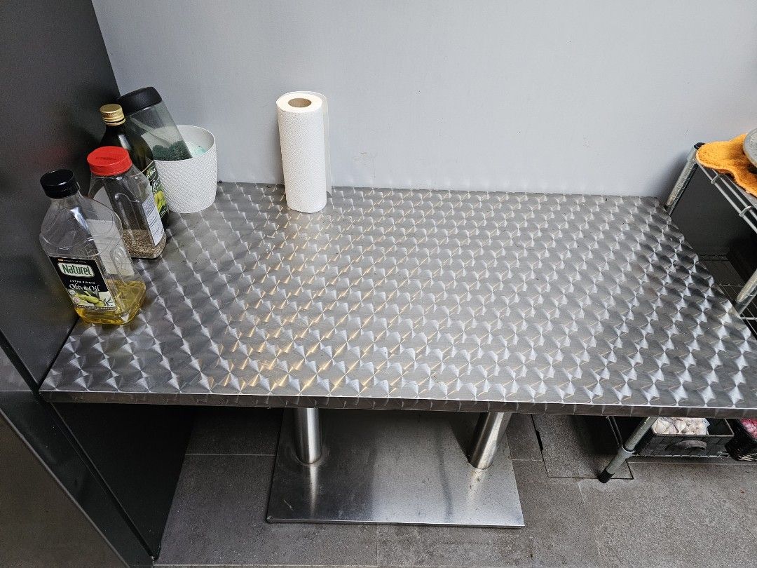 Dining Table (Category: Other Home Furniture) located in Singapore. Submitted by tansam2011.1 (Listing ID 1365749037, Image 3). Description: A year old stainless steel table. Letting go due to space constraints..