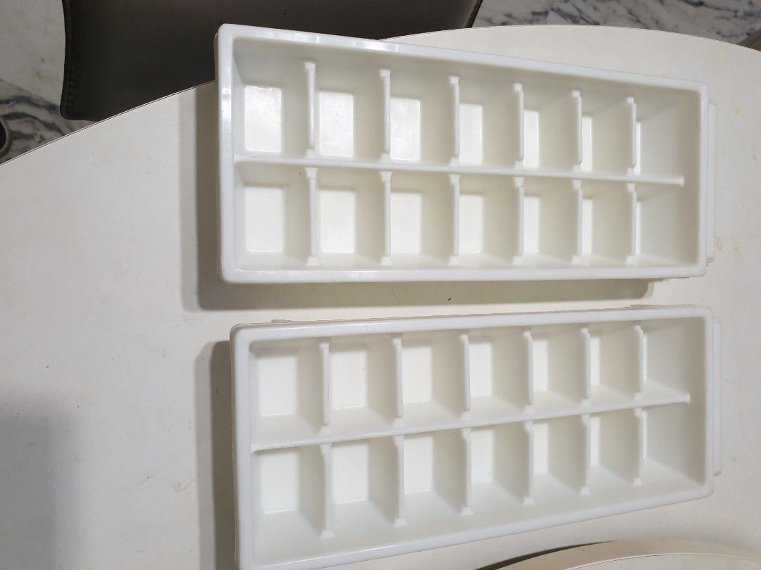 2 New and unused Ice Trays for $5 (Category: Food Organisation & Storage) located in Singapore. Submitted by cecsun3 (Listing ID 1365772536, Image 1). Description: 12 new and unused durable and non breakable white ice cube trays under stock clearance @ $5 for 2 trays. Per tray can make 14 ice cubes. Only 12 trays are available. Ice cubes are easily detached from tray by just a twist and it's user friendly from water to ice. Just love it. Collect 