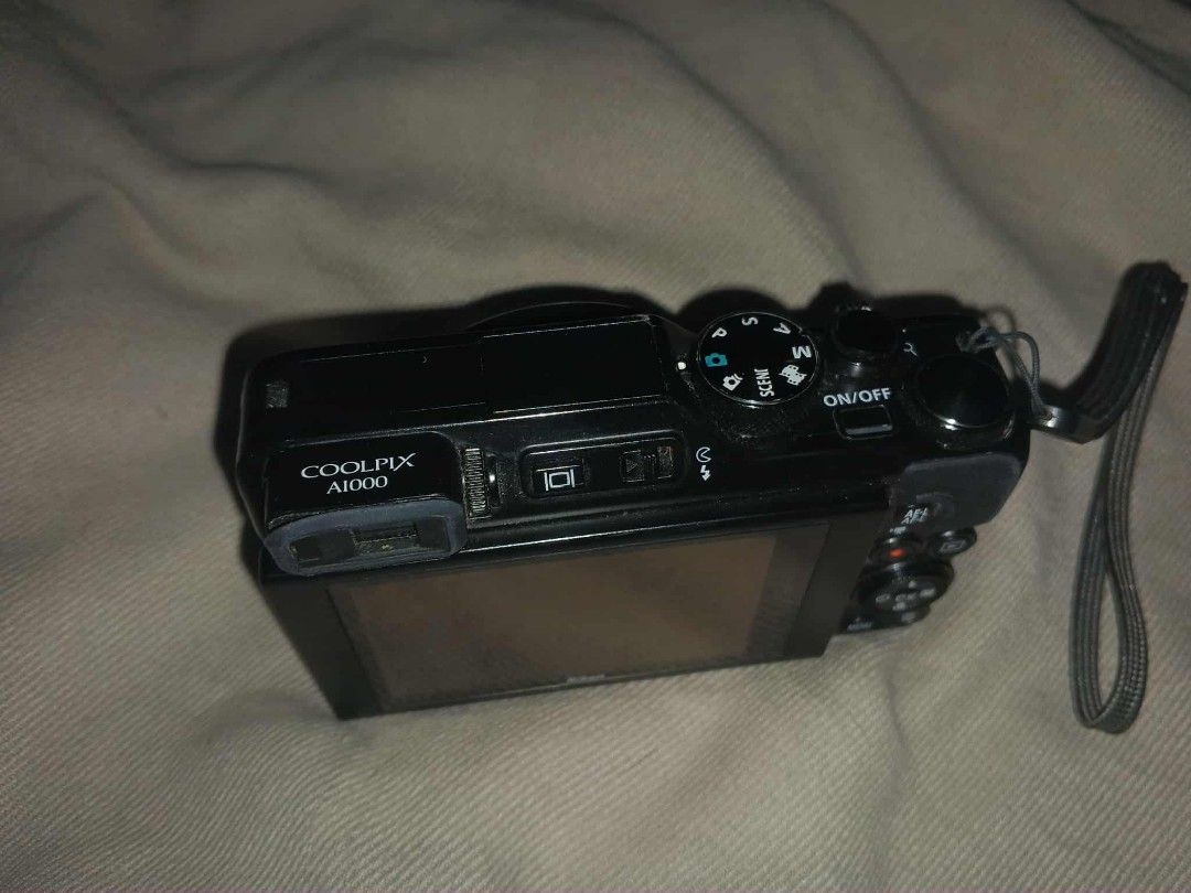 Nikon Digital Camera Coolpix A1000 (Category: Cameras) located in Caloocan City. Submitted by boncatojam19096 (Listing ID 1365740581, Image 2). Description: Nikon Digital Camera Coolpix A1000 that comes with two batteries, 1 SD card and charger. Still working but there are defects on the screen (subject to repairment), and lens cover..