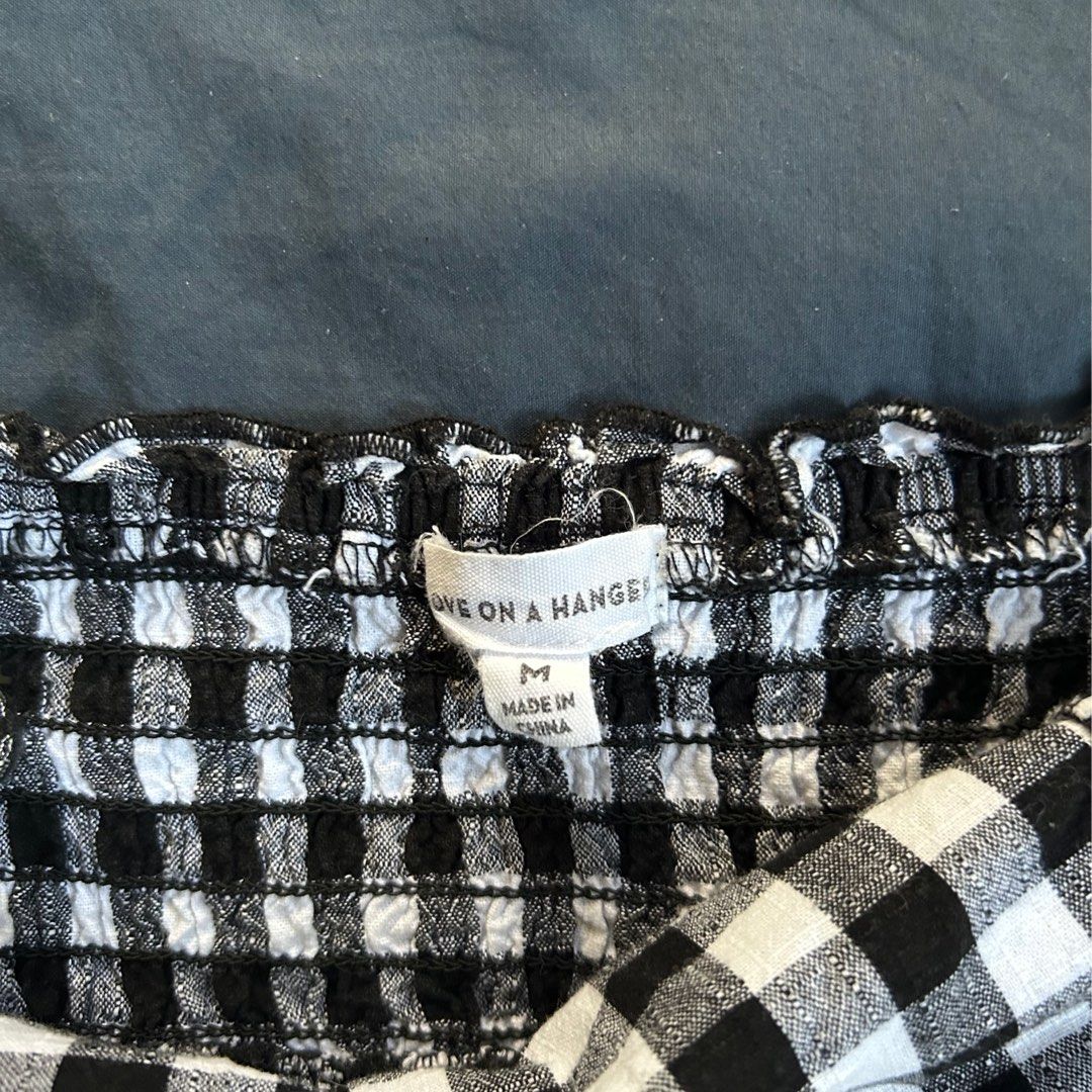 Plaid checkered gingham peplum top (Category: Sleeveless) located in Quezon City. Submitted by p0lingkit (Listing ID 1365709116, Image 3). Description: • rfs: decluttering • material is HQ. Linen texture but cotton • adjustable strap •smocked back part might fit larger bust size Helping tags: Zara uniqlo mango h&m cotton on .