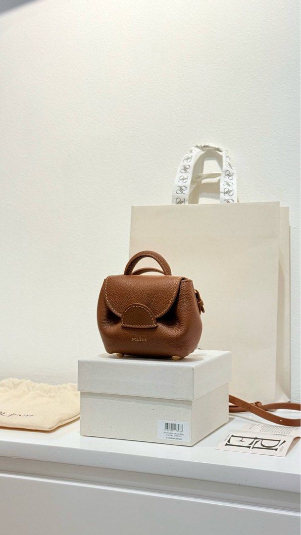 Polene Numero Uno Micro Camel Complete New (Category: Luxury Bags & Wallets) located in Taguig. Submitted by heyhokev (Listing ID 1365794952, Image 2). Description: Selling my Polene Numero Uno Micro in Camel color. Complete and new. Bought in Korea. RFS: Change of mind Meetups in BGC or can be shipped via Lalamove/Grab.