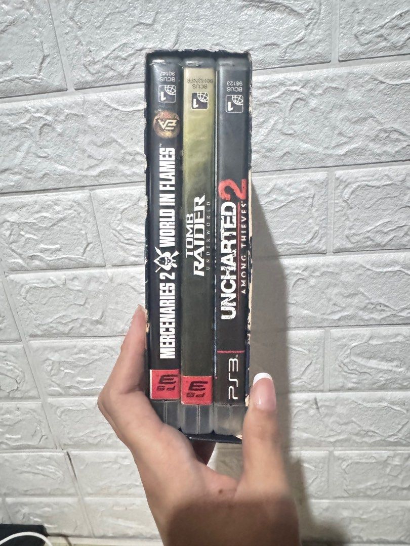 PS3 Game Bundle for Sale – With Original Bundle Box! (Category: PlayStation) located in Taguig. Submitted by findsbyjea (Listing ID 1365817439, Image 2). Description: PS3 Game Bundle for Sale – With Original Bundle Box! • Uncharted 2: Among Thieves • Tomb Raider: Underworld • Mercenaries 2: World in Flames • All original CDs, tested and working • May separate cases + official bundle box (collector’s item!) Condition: • Minor signs of use, no game