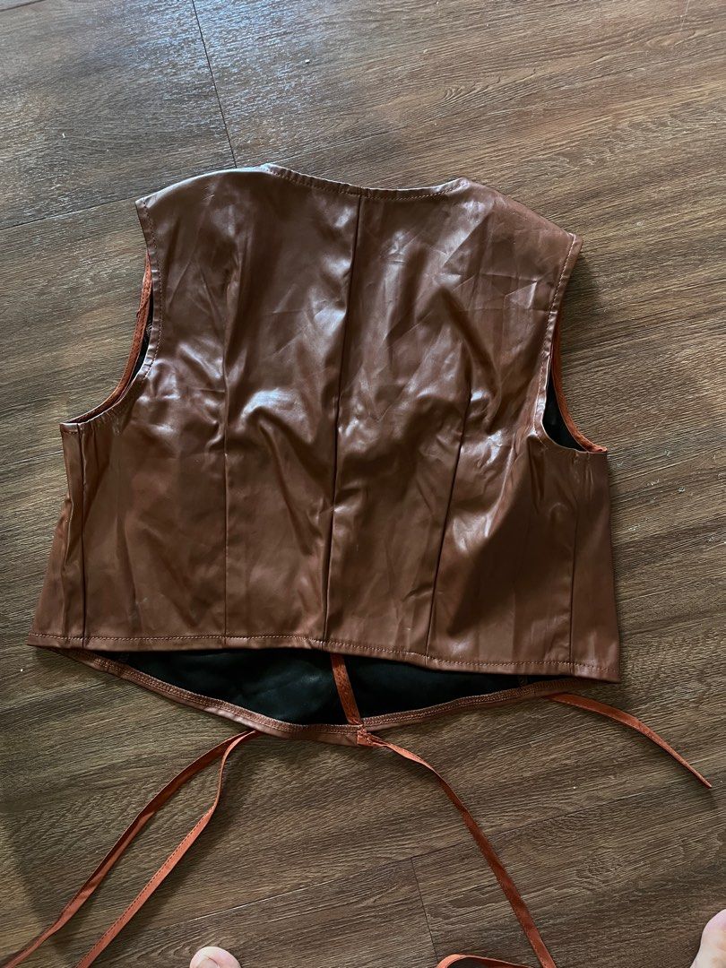 Shein Brown Leather Tie On Vest (Category: Sleeveless) located in Pasay City. Submitted by dbabysauce (Listing ID 1365683992, Image 2). Description: Used twice. Size small. Size true to shein measurements.