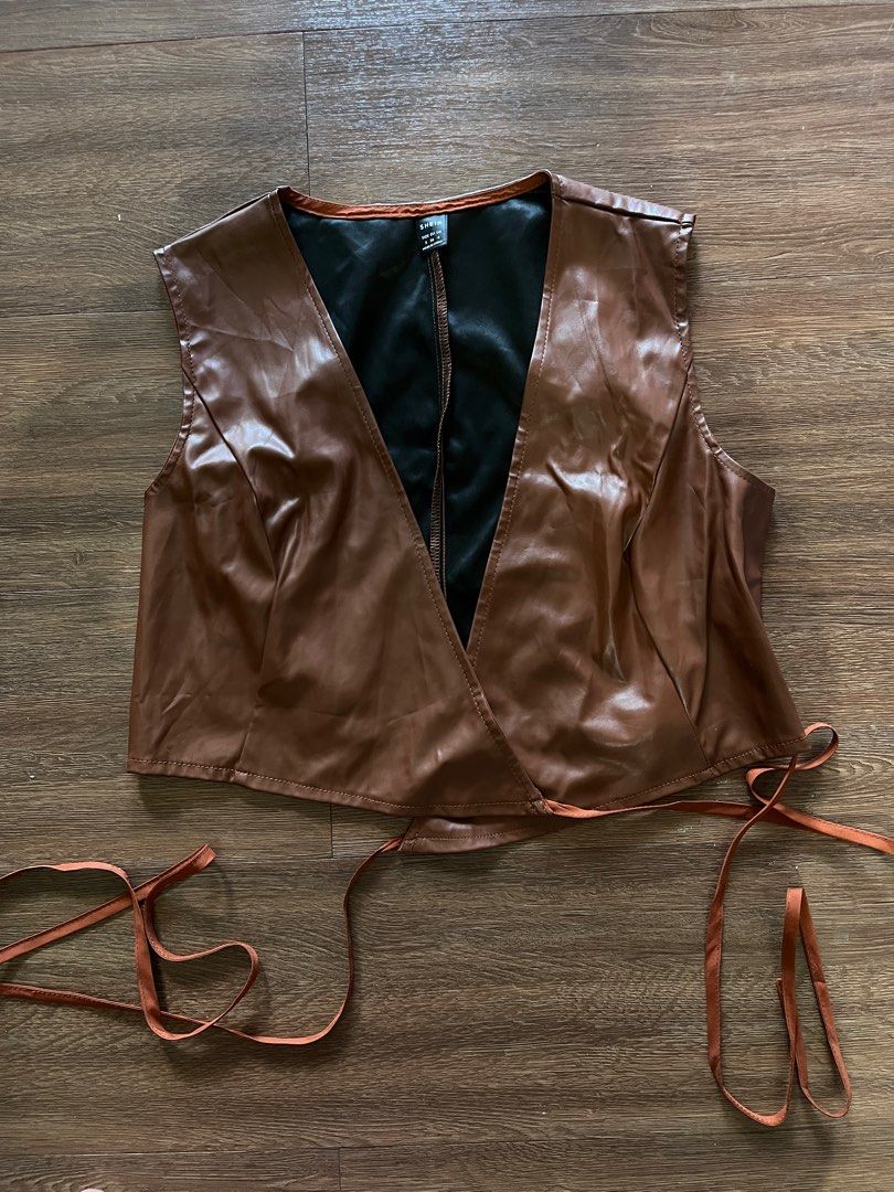Shein Brown Leather Tie On Vest (Category: Sleeveless) located in Pasay City. Submitted by dbabysauce (Listing ID 1365683992, Image 1). Description: Used twice. Size small. Size true to shein measurements.
