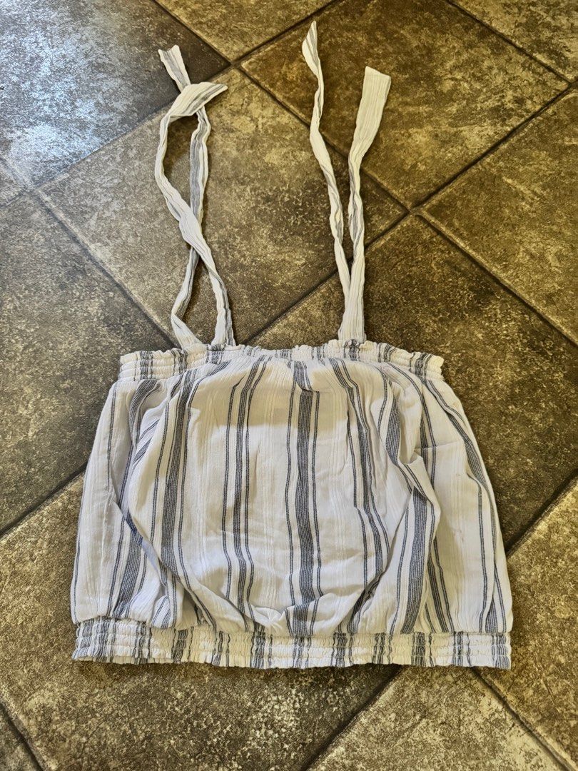 Striped Tie Top (Category: Sleeveless) located in Pasig City. Submitted by denisecerda1221 (Listing ID 1365689454, Image 1). Description: RFS: cleaning out my sister’s closet. PLEASE READ CAREFULLY Delivery fee c/o buyer and WILL BE THE ONE TO ARRANGE shipping via grab/lalamove/gogoexpress or LBC/J&T for provincial. I won’t allow buyers who make excuses to ask me to arrange shipping for them..