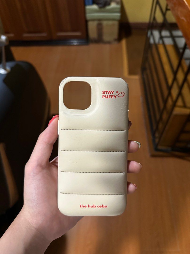 the hub cebu iphone 13 chai latte puffer case (Category: Cases & Sleeves) located in Quezon City. Submitted by mymelodylvr (Listing ID 1365813886, Image 1). Description: honest issue: has torn stitches on the edges due to usage, and some dirt marks .