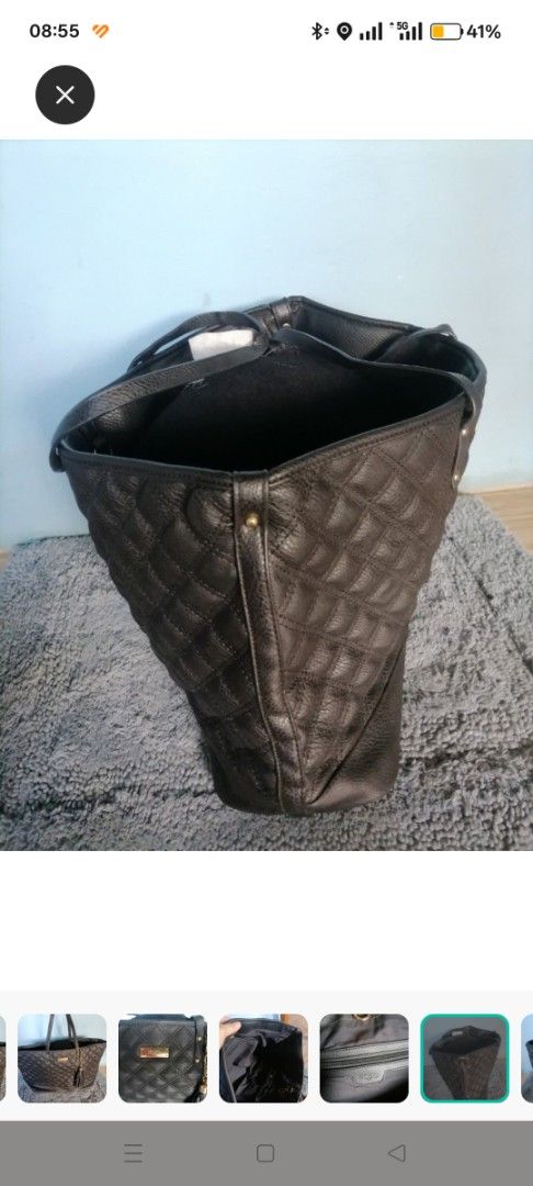 Tote bag (Category: Luxury Bags & Wallets) located in Manila. Submitted by juanalumi (Listing ID 1365653365, Image 3). Description: original no flaws very good condition signed of use spacious tote bag.