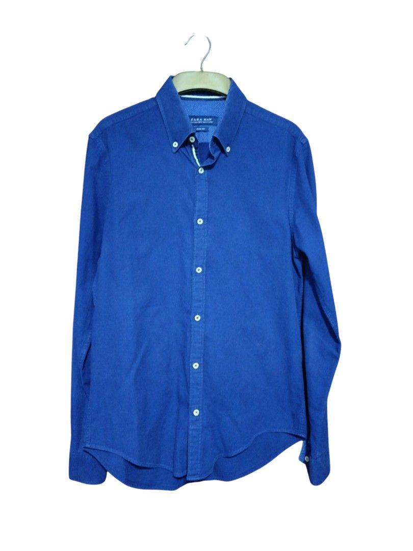 Zara Long Sleeves Polo (Category: Formal Shirts) located in Makati City. Submitted by inxsstuff (Listing ID 1362535679, Image 2). Description: With piped button placket. Actual color is dark blue. With inner sleeves pattern. Medium Slim Fit Payment via Gcash or BPI transfer.