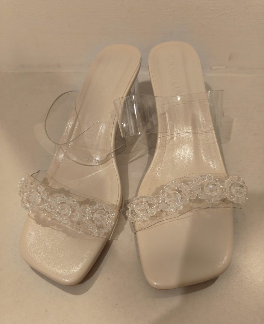 Clear Rhinestone Square Toe Heels (Category: Heels) located in Singapore. Submitted by vulekim61950 (Listing ID 1365954511, Image 2). Description: Selling these cute clear heels with rhinestone detailing! They're a size 38 and have not been worn. The heels are 4cm tall and the square toe is super trendy. Perfect for a night out or a special occasion!.
