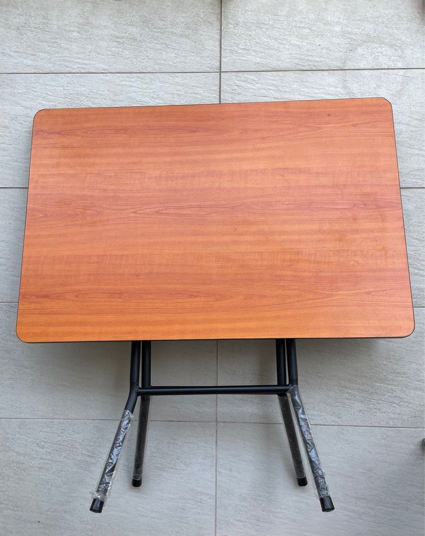 Foldable table (Category: Tables & Sets) located in Singapore. Submitted by thehomestuff (Listing ID 1365878164, Image 1). Description: Foldable table 90cm x 60cm Multi - purpose table Can be used for dining, study .