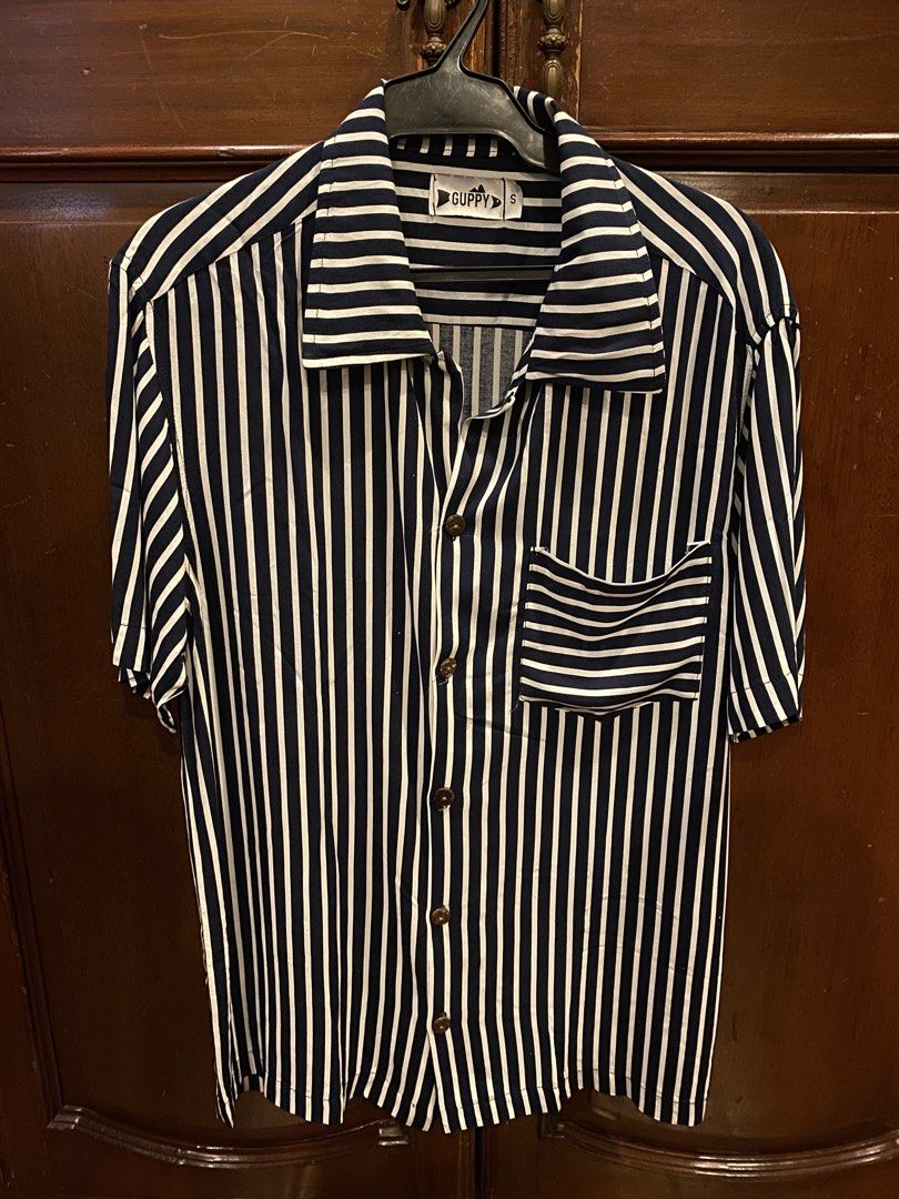 Guppy Cuban Collar Beach Shirt (Category: Tshirts & Polo Shirts ) located in Manila. Submitted by plainteesandmore (Listing ID 1365850057, Image 1). Description: Brand new Size S, fits M-L Loose fit Perfect for beach trips Light and smooth fabric.
