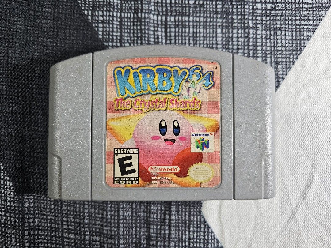 Kirby 64 The Crystal Shards for N64 (Category: Nintendo) located in Angeles City. Submitted by press_start (Listing ID 1365871321, Image 1). Description: For sale Kirby 64 The Crystal Shards for Nintendo 64 Issue: Putol yung isang lock(see pic) pero doesn't affect performance. These are 2nd hand items, manage your expectations. Tested working. Mode of Payment: GCash, Maya, BPI, GoTyme, Seabank Shipping: LBC, J&T.