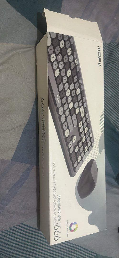 Mofii keyboard (Category: Computer Keyboard) located in Quezon City. Submitted by seller000000123 (Listing ID 1365939927, Image 1). Description: Bluetooth keyboard and mouse Rfs: upgrade to new one .