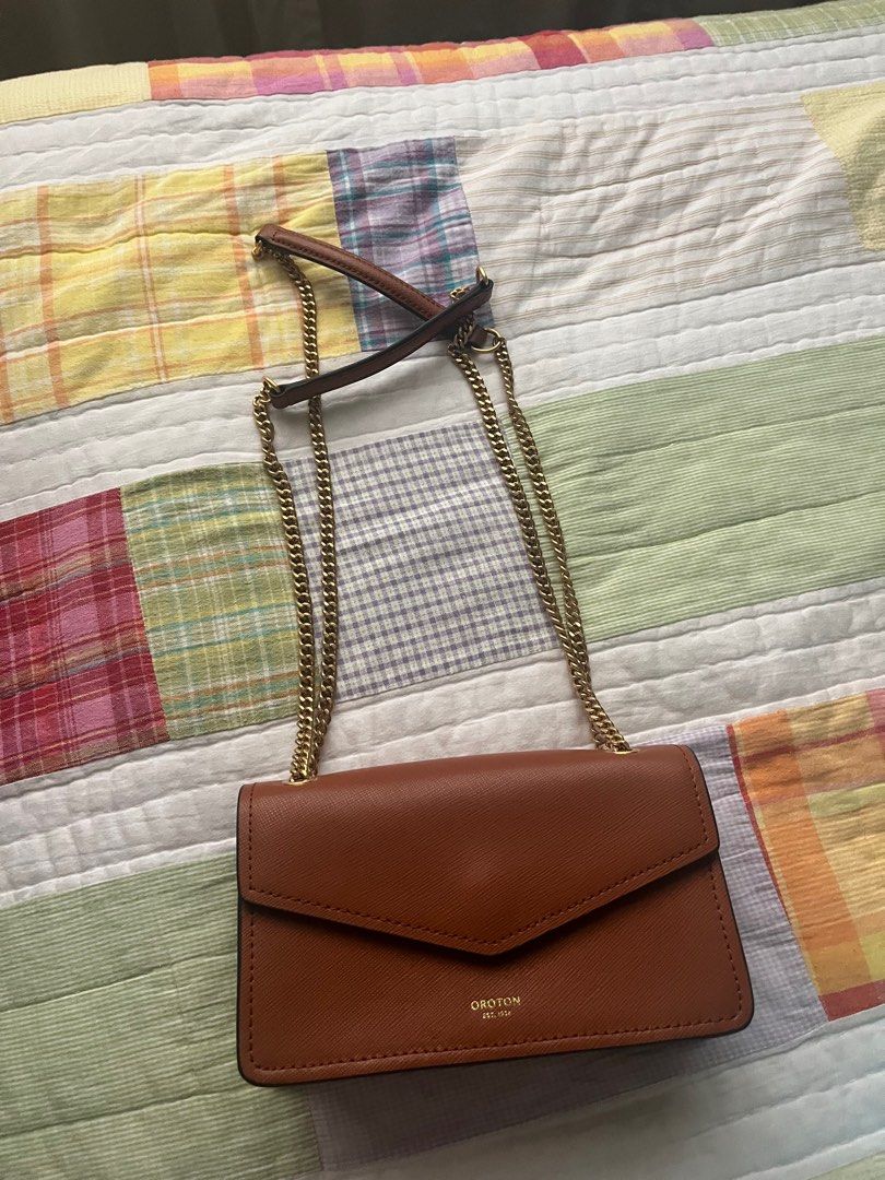 Oroton 2 Way Brown Saffiano Leather Bag (Category: Cross-body Bags) located in Paranaque City. Submitted by _lexus (Listing ID 1365836815, Image 1). Description: Original Oroton Brown Saffiano Leather Mini Bag From Australia, bought directly from store Can be worn 2 ways; as a shoulder or cross body bag Great condition, used only 5x No scratches, still in great shape With minor scratches on magnet clasp closure but you cant see this cause its alw