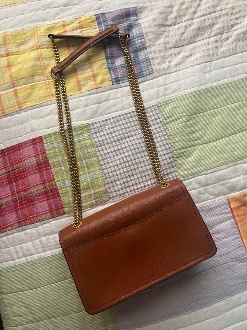 Oroton 2 Way Brown Saffiano Leather Bag (Category: Cross-body Bags) located in Paranaque City. Submitted by _lexus (Listing ID 1365836815, Image 3). Description: Original Oroton Brown Saffiano Leather Mini Bag From Australia, bought directly from store Can be worn 2 ways; as a shoulder or cross body bag Great condition, used only 5x No scratches, still in great shape With minor scratches on magnet clasp closure but you cant see this cause its alw