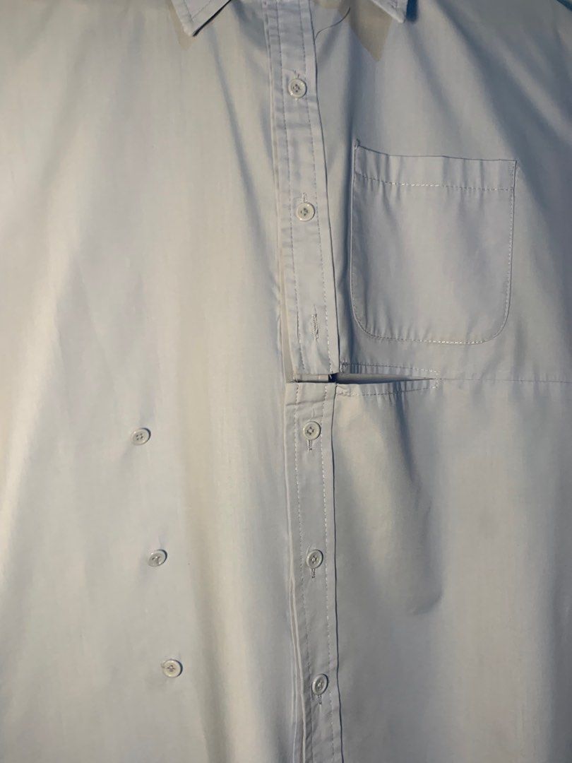 random unique light blue polo long sleeve unisex (Category: Tshirts & Polo Shirts ) located in Manila. Submitted by rienkay (Listing ID 1365946520, Image 3). Description: random brand light blue polo long sleeve L 29-30 in W 23 in stylish half cut on the front side of polo (see pic 3)... can be worn alternatively using bottom half buttons (see last pic) used 1-2 times, very good quality, great color, can play around with the style ! dm for more i