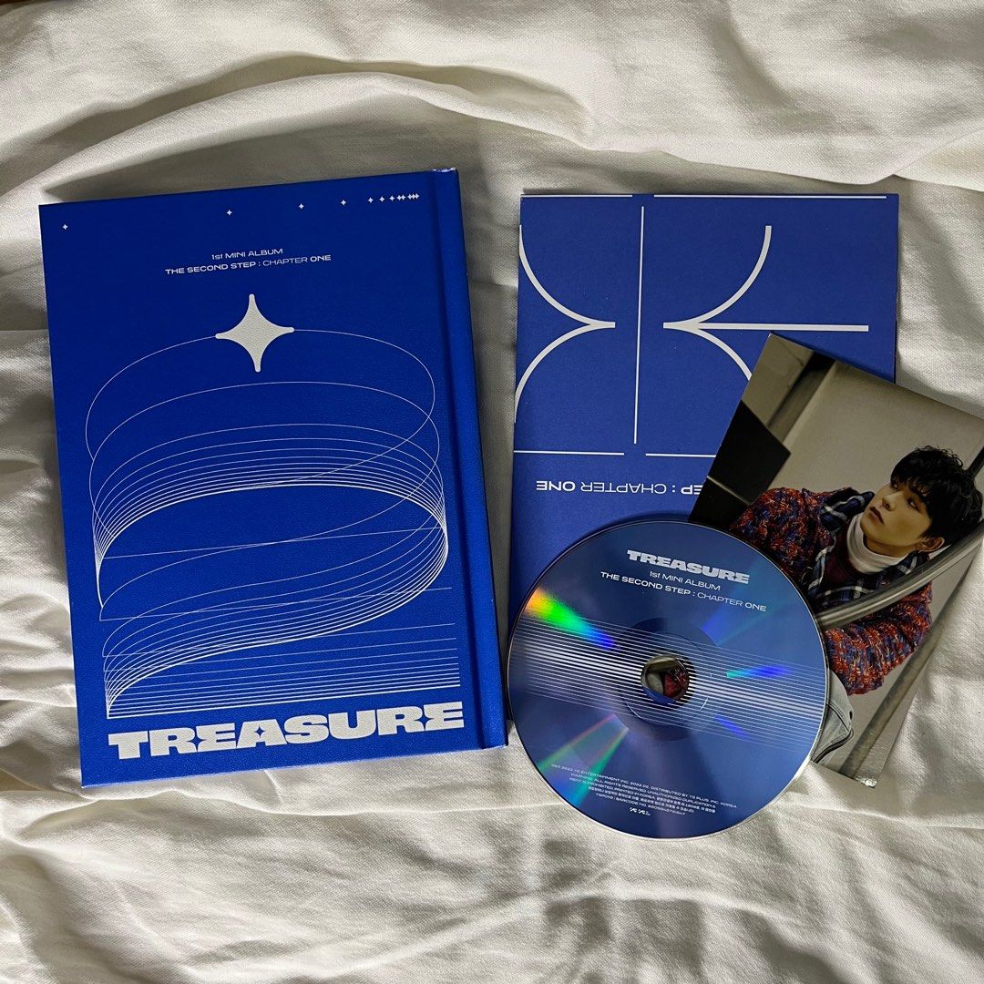 [UNSEALED] TREASURE - The Second Step : Chapter One (Set) with inclusions (Category: Storybooks) located in Quezon City. Submitted by oddatellier (Listing ID 1365881593, Image 3). Description: set !! the blue ver. box has a tear — see last photo inclusions: - booklet (2) - CD (2) - postcards (2) - sticker (1) - folded poster (3) - freebies ! dm me for more info .