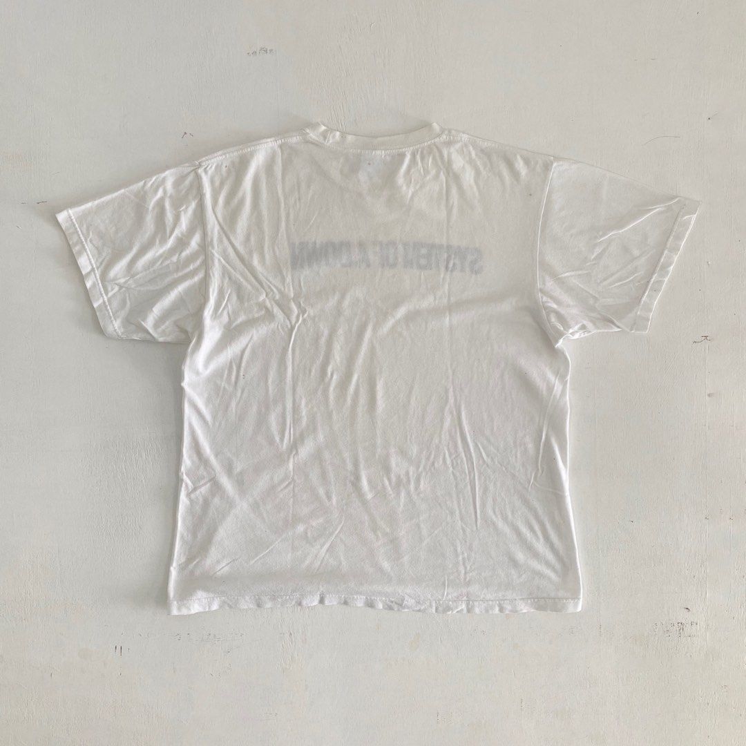 Y2K System Of A Down (SOAD) spellout Tshirt (Category: Tshirts & Polo Shirts) located in Johor Bahru. Submitted by h_________ (Listing ID 1366168637, Image 2). Description: Y2K System Of A Down (SOAD) spellout tshirt Size (ukuran manual): 22.5” (chest)x 27.5” Colour: White Condition: 8/10 (refer photo).