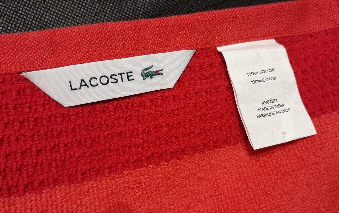 Authentic Lacoste Bath Towel + Freebie (Category: Bath) located in Marikina City. Submitted by dollcollectorph (Listing ID 1366186643, Image 3). Description: Authentic Lacoste Bath Towel US 🇺🇲 bought Brand New with tags Color : Red 100% Cotton 30 x 52 inch + Freebie ! a 600php value, please see picture *What you see is what you get MOP : Metrobank, Gcash + shipping fee.