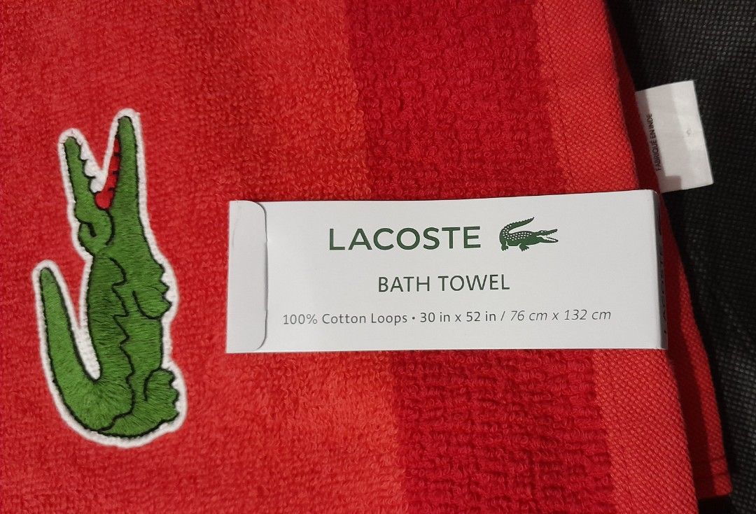 Authentic Lacoste Bath Towel + Freebie (Category: Bath) located in Marikina City. Submitted by dollcollectorph (Listing ID 1366186643, Image 2). Description: Authentic Lacoste Bath Towel US 🇺🇲 bought Brand New with tags Color : Red 100% Cotton 30 x 52 inch + Freebie ! a 600php value, please see picture *What you see is what you get MOP : Metrobank, Gcash + shipping fee.
