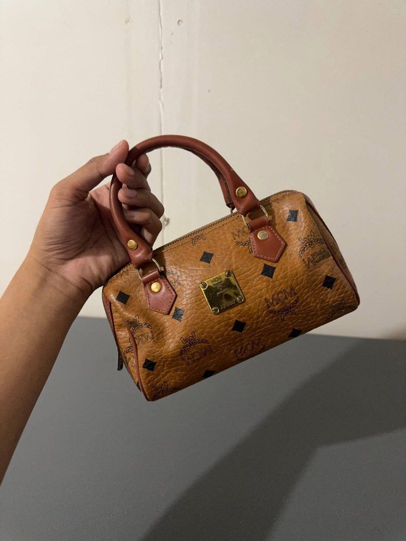 Authentic McM Nano Bag (Category: Luxury Bags & Wallets) located in Quezon City. Submitted by jhaediah (Listing ID 1366068457, Image 1). Description: preloved and good condition Nano m CM Cute! Bili nalang kayo ng strap .