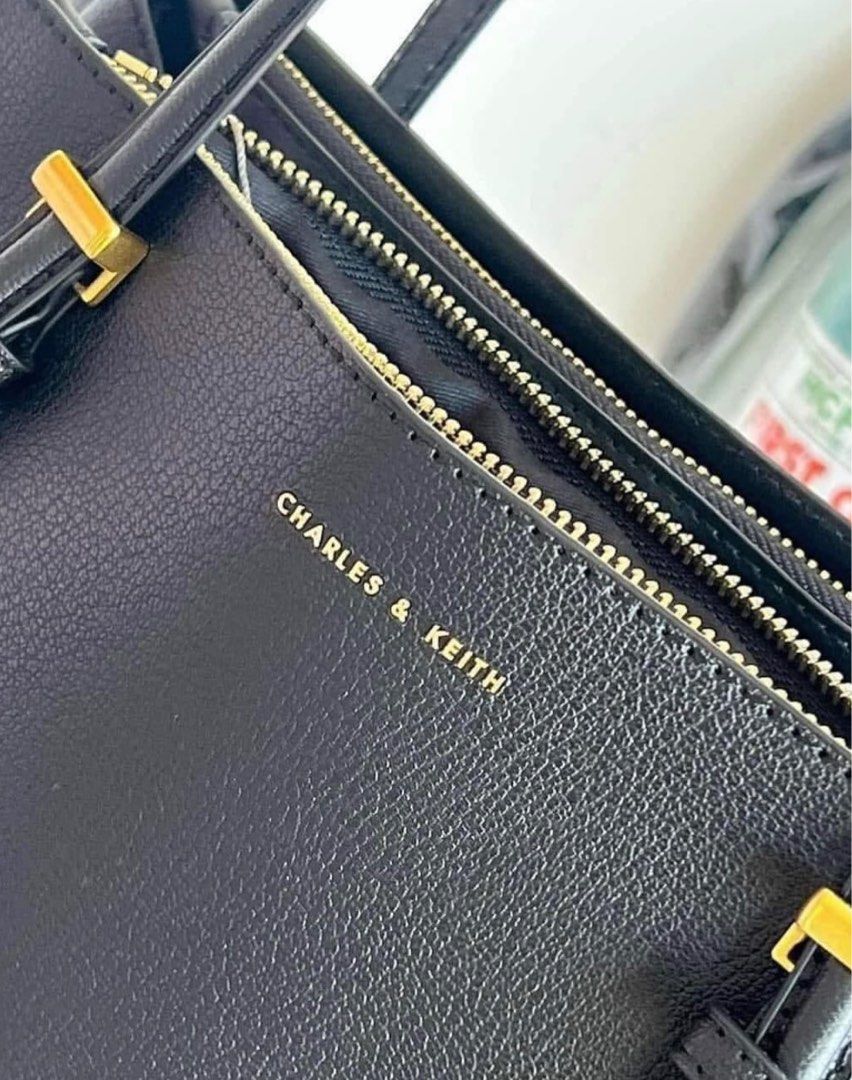 Charles & Keith Sanza Tote Bag (Category: Tote Bags) located in Manila. Submitted by bglife (Listing ID 1366134360, Image 2). Description: Brand new Can fit up to 15” laptop Loc: Pasig-Santolan Mop: Gcash Mod: J&T/Sdd .