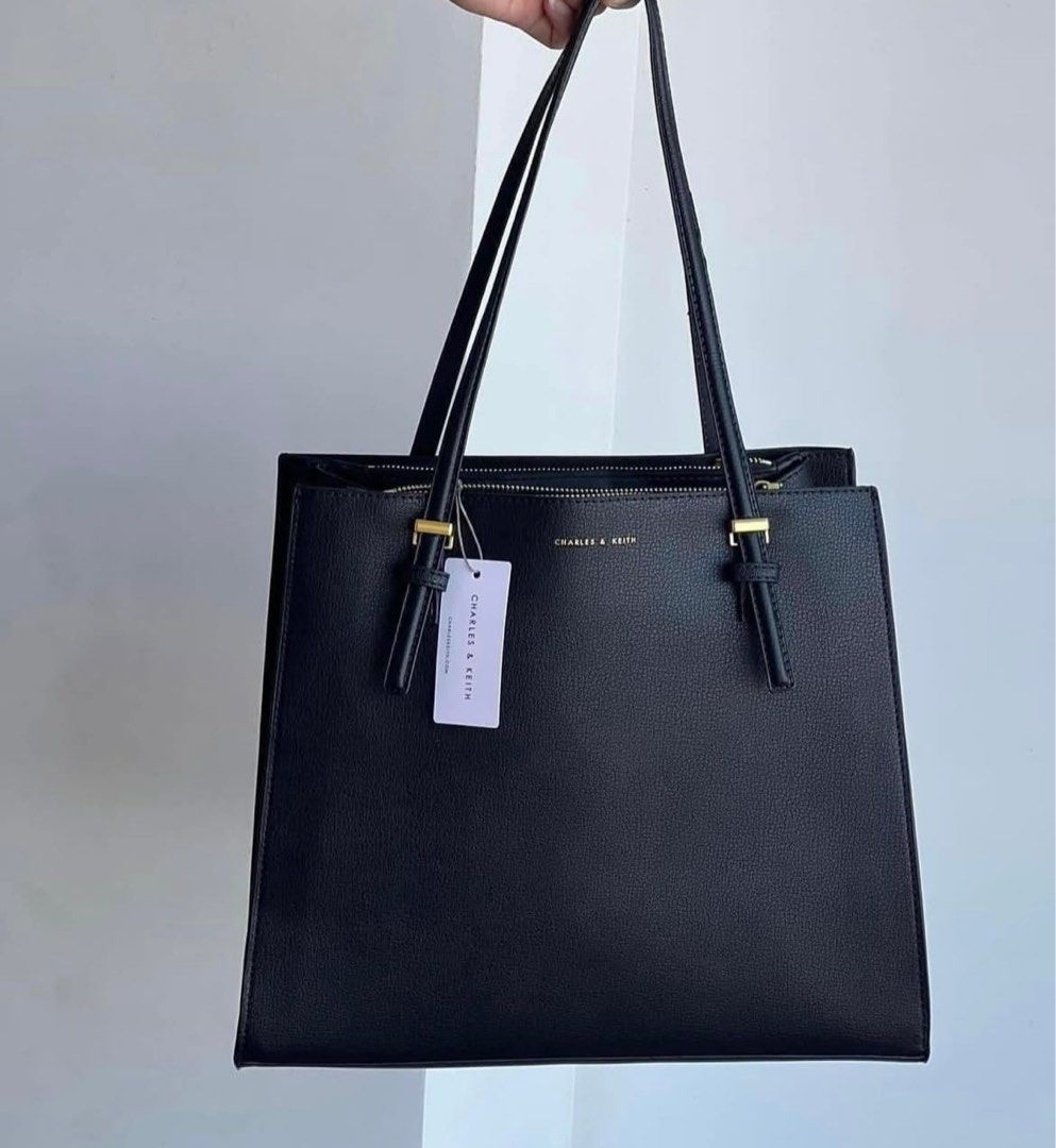 Charles & Keith Sanza Tote Bag (Category: Tote Bags) located in Manila. Submitted by bglife (Listing ID 1366134360, Image 1). Description: Brand new Can fit up to 15” laptop Loc: Pasig-Santolan Mop: Gcash Mod: J&T/Sdd .
