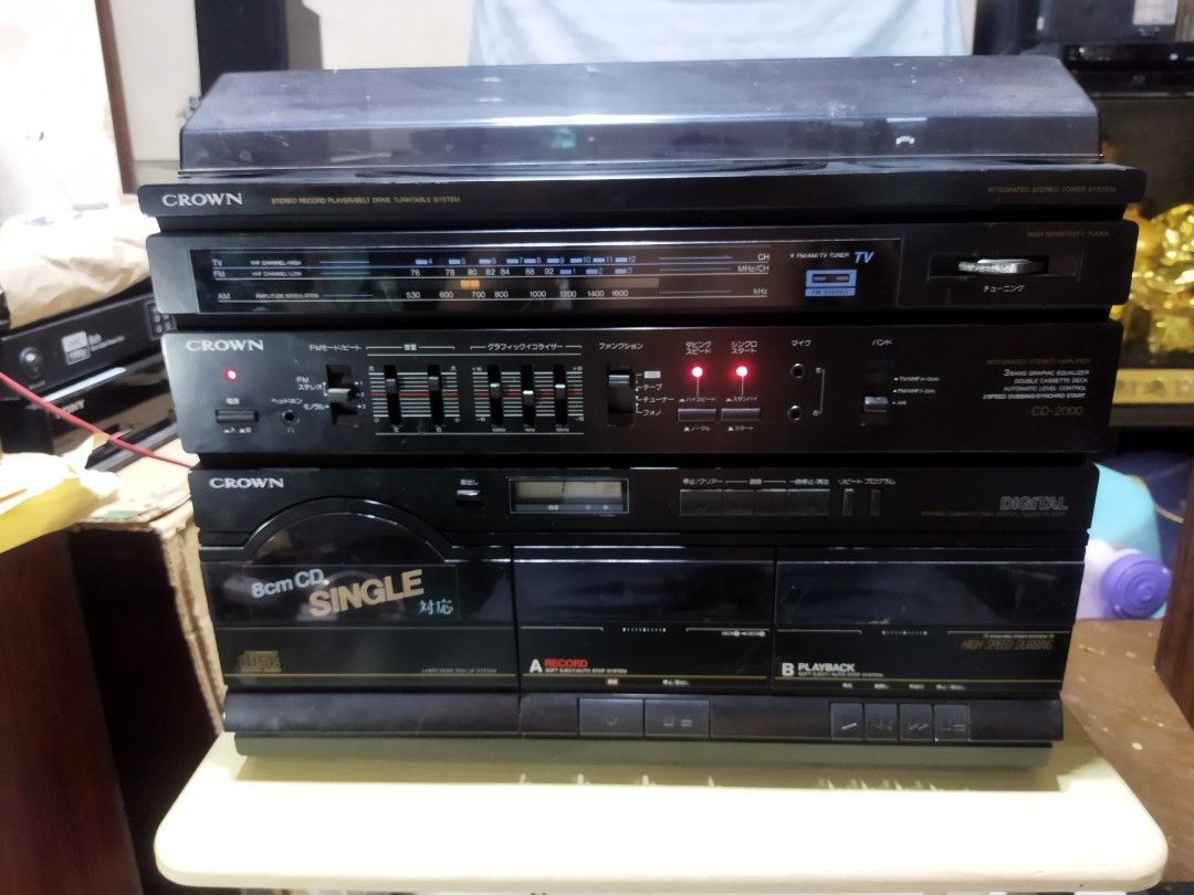 Crown 4in1 component system (Category: Soundbars, Speakers & Amplifiers) located in Pasay City. Submitted by marineljapansurplus (Listing ID 1366056948, Image 1). Description: Crown 4in1 Head Unit only Vintage Stereo Component System CD-2000 Made in Japan Tuner/CD/Cassette/Phono 3 band equalizer 2 mic input Tuner 📻: 👍Complete all local FM/AM station/ with VHF station CD 💿: 👍 working Cassette 📼: 👍Working Phono : With needle. Not spinning (ma