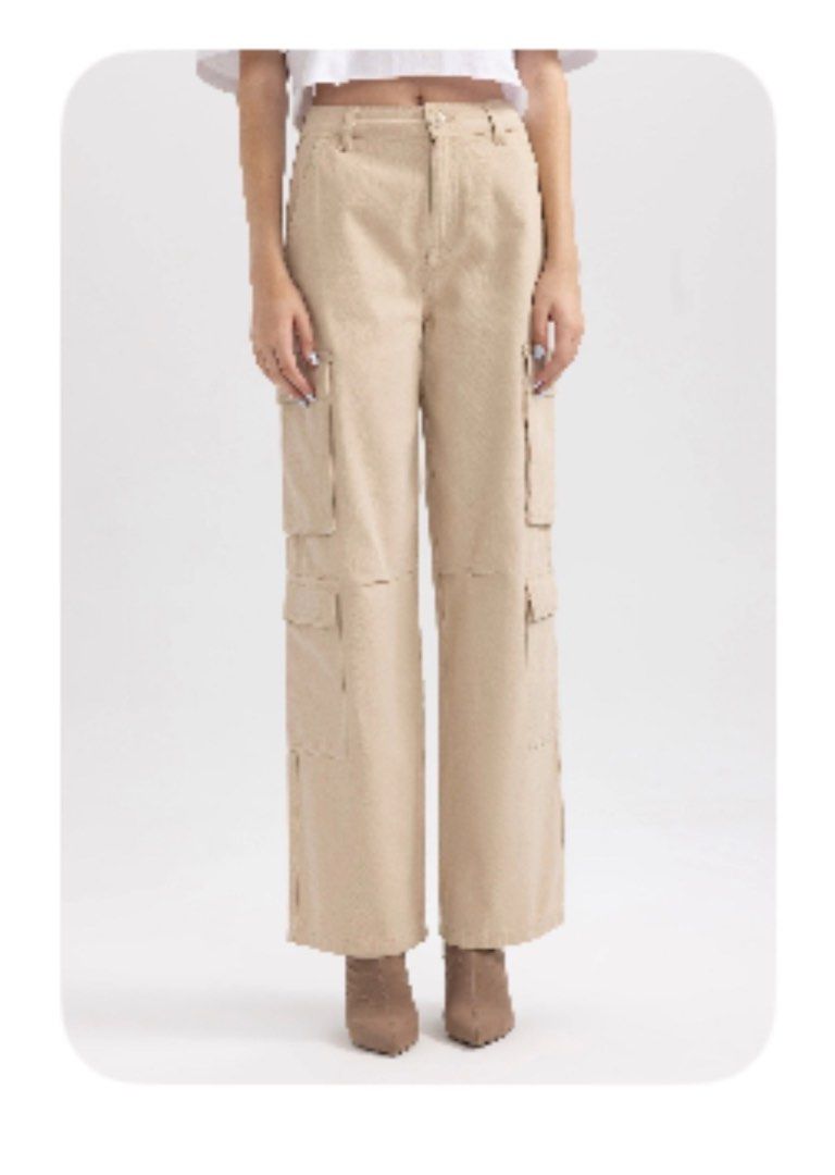 DeFacto Straight Fit Woven Cargos - size S (Category: Other Bottoms) located in Makati City. Submitted by pandora42 (Listing ID 1366181512, Image 2). Description: BN DEFACTO CARGO PANTS size S Brand New, never used! 4 side pockets, 2 back pockets Main Fabric Content : Cotton 100% Fabric Detail : Gabardine Color : Beige Waist (cm) 66- 68 Waist (inch) - 26 - 28 Hip (cm) 94 Hip (inch) 37 Inner length (cm) 77 Inner length (inch) 30.3.