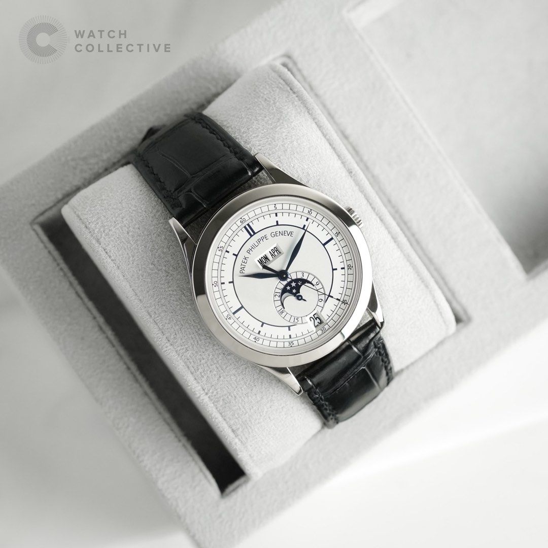 📝FULL SET📦 Patek Philippe Annual Calendar Moonphase Sector dial 5396G-001 || 5396 (Category: Watches) located in Singapore. Submitted by w.coll (Listing ID 1366182990, Image 2). Description: Discontinued Sector dial. Current model retails for 76k, grab this at a steal! Complete set with matching hangtag and envelope. Original Patek strap and original deployment clasp!! Brand: Patek Philippe Reference: 5396G-001 Comes with: Box and Papers Dated: