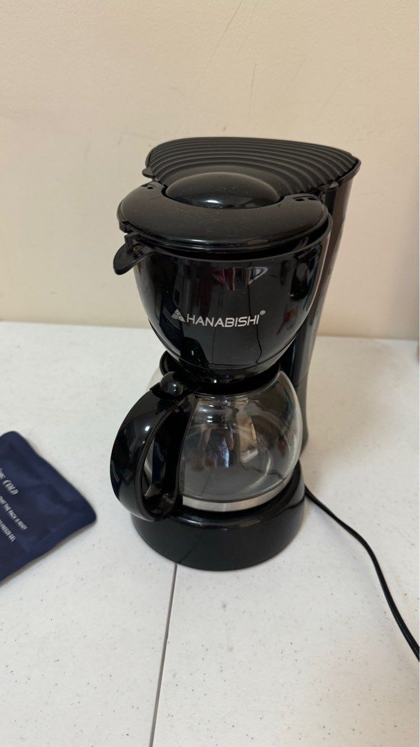 Hanabishi coffee maker (Category: Coffee Machines & Makers) located in Quezon City. Submitted by seeeeeed (Listing ID 1366101176, Image 2). Description: no issues, with coffee stain lang sa filter..