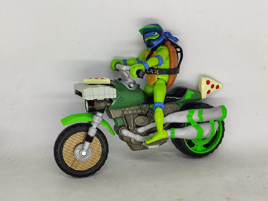 Playmates TMNT - Ninja Kick Cycle with Leonardo (Category: Action & Battle Toys) located in La Trinidad. Submitted by Spawnerist_Collectibles (Listing ID 1366083515, Image 1). Description: ▫️Playmates ▫️TMNT ▫️Ninja Kick Cycle with Leonardo ▫️HAS SOME MISSING ACCESSORIES (not sure what exactly it is) ▫️WHAT YOU SEE IS WHAT YOU WILL GET. ▫️Shipping Nationwide ▫️Payment is through GCash or Bank transfer..