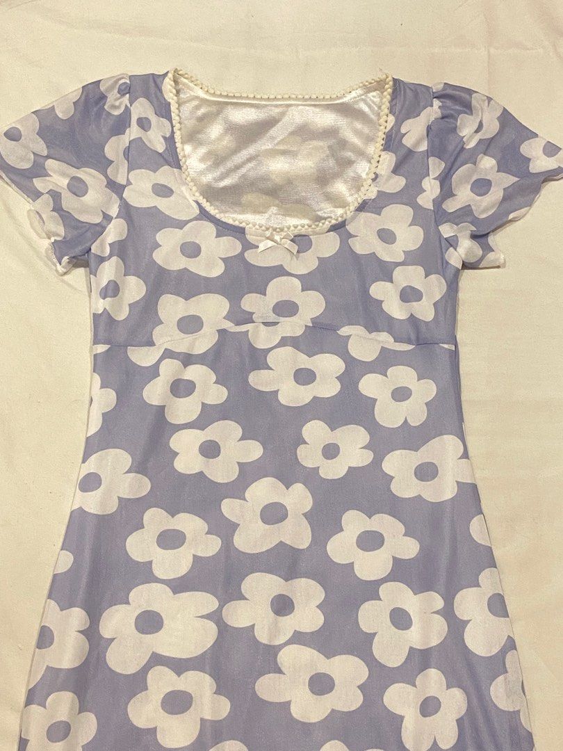 Purple Floral Dress (Category: Dresses) located in Quezon City. Submitted by mickiedeang (Listing ID 1366106741, Image 2). Description: Super pretty dress!! Stretchy and high quality fabric. Fits XS-semi medium Worn only once, see photos for when worn. Price negotiable..