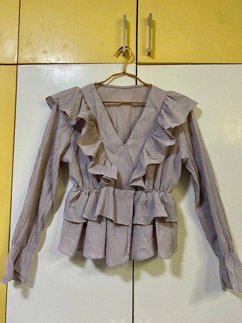 Raffled Blouse (Category: Blouses) located in Pasig City. Submitted by espnyl07 (Listing ID 1366068700, Image 1). Description: Plum Raffled Long Sleeve Blouse Fits S to M.