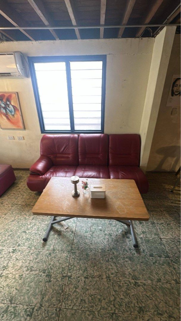 Red leather sofa and coffee table mid modern century (Category: Sofas) located in Angeles City. Submitted by meenshopsss (Listing ID 1366070506, Image 1). Description: Take all for 12k, red sofa and a coffee table that’s adjustable.